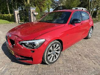 schade BMW 1-serie 118i Business Sport 125 Kw