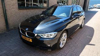 uszkodzony samochody osobowe BMW 3-serie BMW 3-serie Touring 320i Edition M Sport Shadow High Executive 2018/4