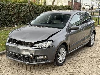 Coche accidentado Volkswagen Polo 1.2 TSI | Highline | Cruise control | PDC | 1e Eigenaar | 2014/8