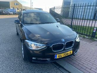 damaged passenger cars BMW 1-serie AUTOMAAT XENON 2014/6