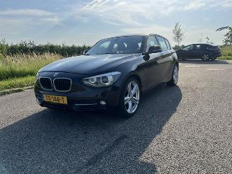 Coche accidentado BMW 1-serie 114i EDE High Executive 2014/5
