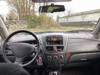 Suzuki Liana 1.6 MPi 16V Hatchback 4Dr Benzine 1.586cc 76kW (103pk) FWD 2001-07/2008-04 (ERC31) M16A picture 16