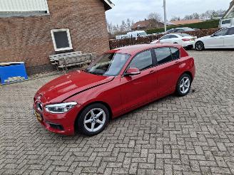 Schadeauto BMW 1-serie 118i  136pk navi clima 2017/3