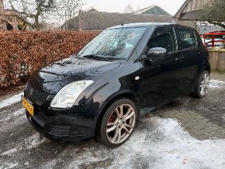 skadebil auto Suzuki Swift 1.3 AIRCO 5DRS SPORTVELGEN 2010/3
