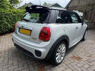 damaged passenger cars Mini Cooper 1.5 JWC PAKKET NL NAVI AIRCO LUXE UITVOERING 2016/6