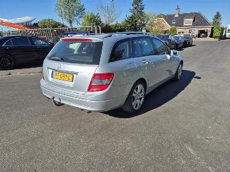 Vaurioauto  passenger cars Mercedes C-klasse C 180 KOMPRESSOR estate 2009/5