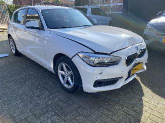 skadebil auto BMW 1-serie 118i 5drs 2016/1