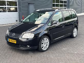 Vaurioauto  passenger cars Volkswagen Touran 1.4 16V TSI 140 MPV  Benzine 1.390cc 103kW (140pk) 2006/11