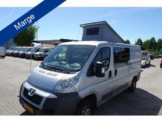 damaged campers Peugeot Boxer peugeot boxer buscamper met hefdak draai stoel 2 x schuifdeur clima 2012/8
