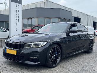 Schadeauto BMW 3-serie 330i High Executive AUTOMAAT 2019/7