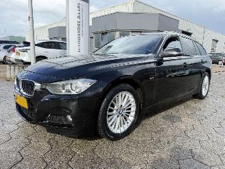 Auto incidentate BMW 3-serie Touring 320i Upgrade Edition 2014/2