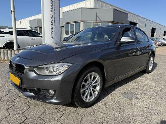Damaged car BMW 3-serie 320i High Executive 2012/5