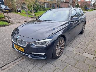 Schadeauto BMW 3-serie 318i lux.edition automaat 2019/6