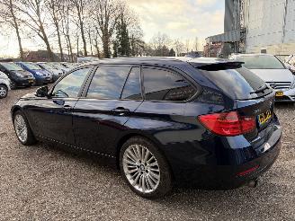 BMW 3-serie 320i xDrive High Executive 4x4 automaat picture 3