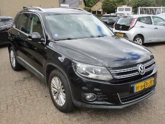 damaged passenger cars Volkswagen Tiguan 1.4 TSI Sport&Style rest bpm 300 euro 2014/7