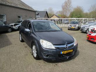 uszkodzony samochody osobowe Opel Astra STATION WAGON 1.6 Temptation 2007/9