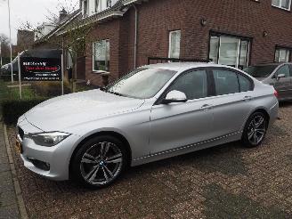 damaged passenger cars BMW 3-serie 320i High executive 2012/5