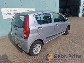 Daihatsu Cuore Cuore (L251/271/276), Hatchback, 2003 1.0 12V DVVT picture 2