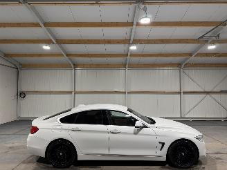 damaged passenger cars BMW 4-serie 418i 100kW Automaat Centennial High Executive 2017/1