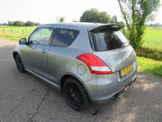 skadebil auto Suzuki Swift 1.6 SPORT136pk camera navigatie clima 2012/10