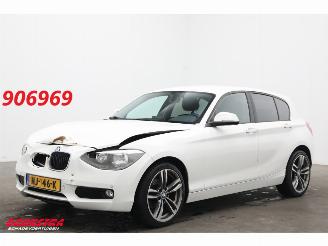 Damaged car BMW 1-serie 116i 5-DRS Navi Bluetooth Airco PDC SHZ 2014/9