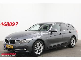 Damaged car BMW 3-serie Touring 318i WASSER Sport Navi Clima Cruise SHZ 2015/12