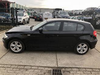 Damaged car BMW 1-serie 116i 5 drs 2.0 E5 2011/3