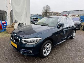 skadebil auto BMW 1-serie 118i Centennial High Executive 2016/10