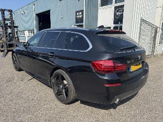Voiture accidenté BMW 5-serie 520i Luxury Edition 2014/5
