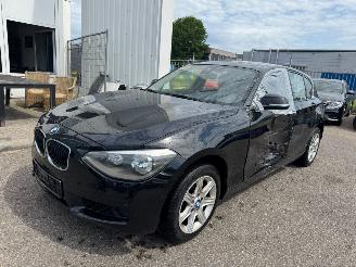 krockskadad bil auto BMW 1-serie 116i AUTOMAAT 2013/1