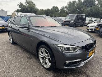 Unfallwagen BMW 3-serie 318i Luxury Edition 2018/9
