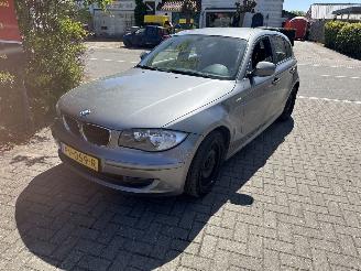 skadebil auto BMW 1-serie 116 I High Executive 2010/3
