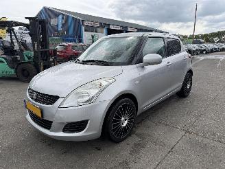 Auto incidentate Suzuki Swift 1.2 69KW Airco Comfort 5-Drs 2011/11