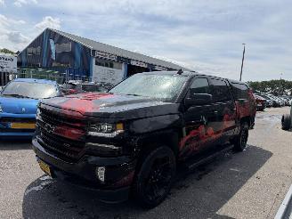 Schadeauto Chevrolet Silverado 5.3 V8 265KW Autom. Schuifdak Clima Navi Led Xenon Huif GRIJS KENT LPG 2016/11