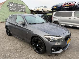 Damaged car BMW 1-serie 118i 100KW Autom. M Sport Shadow High Executive Clima Navi 5-Drs Led Xenon 2019/9