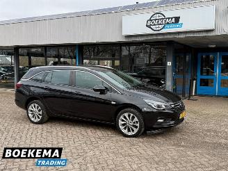 Damaged car Opel Astra Sports Tourer 1.0 Edition Automaat Navigatie Clima Cruise PDC 2016/7