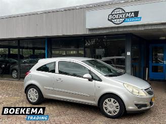 damaged passenger cars Opel Corsa 1.2-16V Enjoy Trekhaak Metalic 2006/11