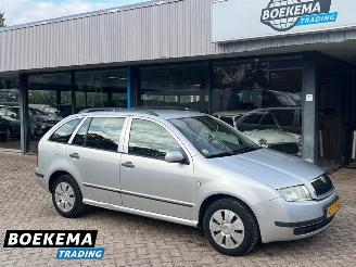 damaged passenger cars Skoda Fabia Combi 1.4-16V Choice Airco Cruise PDC 2004/6