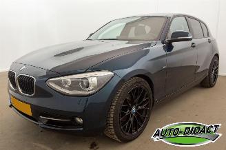 krockskadad bil auto BMW 1-serie 114i Navi Airco Stoelverwarming Leder Upgrade Edition 2013/3