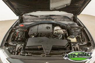 BMW 1-serie 116i  Airco Leder Navi Stoelverwarming Upgrade Edition picture 35