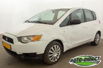 uszkodzony samochody osobowe Mitsubishi Colt 1.1 Edition One Airco 2010/9