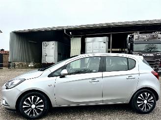 Schadeauto Opel Corsa-E 1.0 Turbo 90pk 6-bak online edition 5drs - nap - stuurverw + stoelverw - pdc v+a - airco - cruise 2017/9