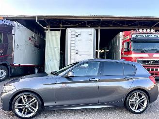 krockskadad bil auto BMW 1-serie 120i 177pk 8-traps aut M-Sport - schuifdak - navi - pdc - keyless - alcantara - zwarte hemel - stoelverw 2015/7