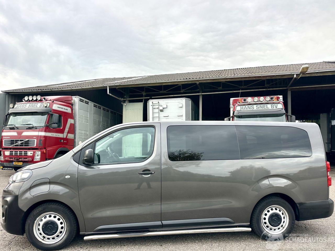 Opel Vivaro E Combi 75kWh 136pk aut 9-Pers lang - nap - pano - 1e eig - leer - airco - cruise - pdc - privacy glass