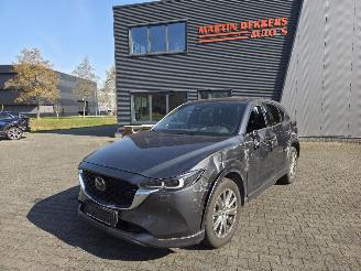 damaged passenger cars Mazda CX-5 2.4 -143KW /AW-D / TAKUMI / SCHUIFDAK / LEER / HEAD UPP 2024/7