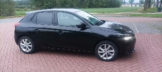 Coche accidentado Opel Corsa Bj:07-2020 1.2 Benzine Led-Koplampen Navigatie Stoelverwarming Lichtautomaat cruisecontrol Regensensor Drivelane assistent Stuurwiel met verwarming Privacy glas 2020/7