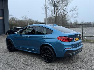 Damaged car BMW X4 M40i 360Pk Centenial High Executive Schuifdak Harman Kardon Head-Up 2016/9