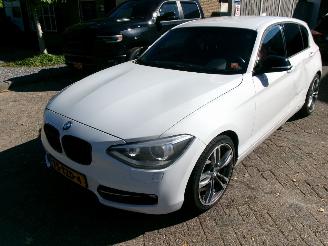 Damaged car BMW 1-serie 118 I BUSINEES+ CLIMA NAVI 2012/5