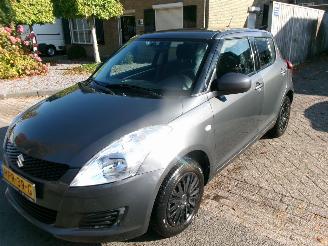 krockskadad bil auto Suzuki Swift 1.2 COMFORT 4X4 AIRCO 2012/6