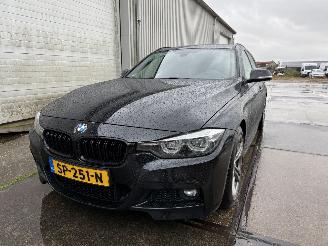 Schadeauto BMW 3-serie Touring 320i M-Sport Automaat 2018/5